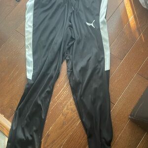 Nine pairs of pants, Adidas, under armour, puma, sizes M-L